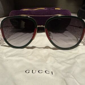 Gucci Women's Sunglasses with Green and Red Highlights